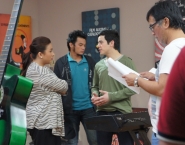 Working on a scene with his co-stars Ana Guillen Feleo and Alwyn Uytingco, and director Mac Alejandre, 